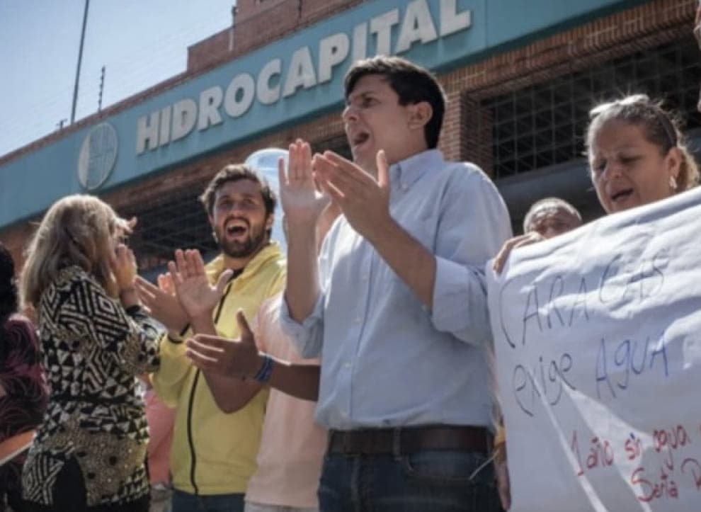 Jesús Armas speaking at a public event - Image 1